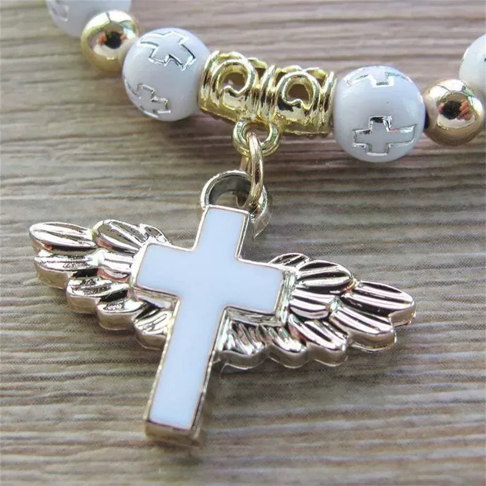 angel cross charm stretch bracelet - maifrenco inc